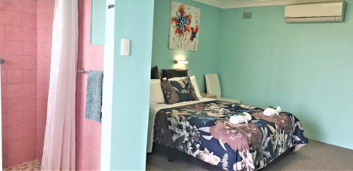 Queen Partial Ocean View Room Accommodation at Ocean View Motel - Mollymook NSW. Free Wi-Fi is included.

